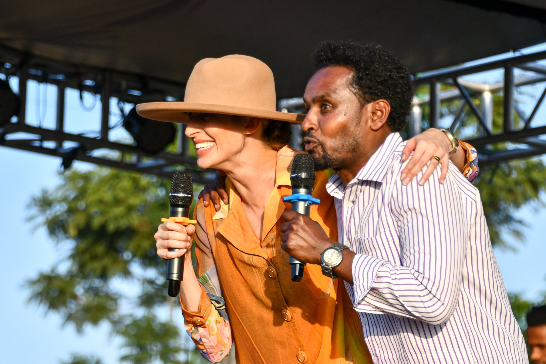 Ministry leaders sharing the Gospel from the stage