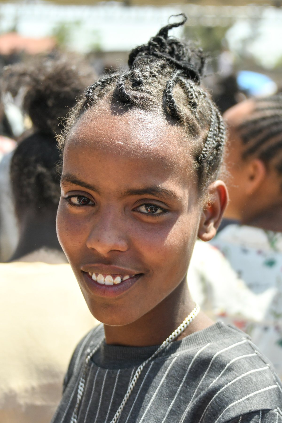 Smiling woman in the crowd