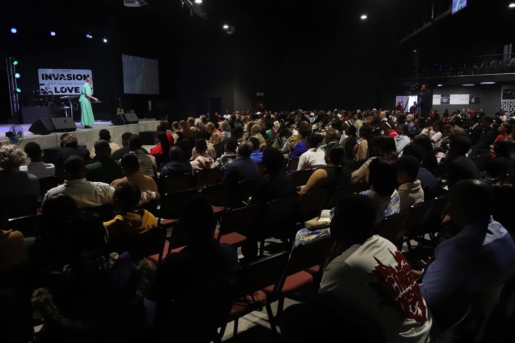 Believers gathered at an invitation event